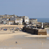 Buy canvas prints of St Ives Beach and Lighthouse in Cornwall by Rosie Spooner
