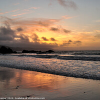 Buy canvas prints of Moody sunrise at Looe Beach by Rosie Spooner
