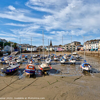 Buy canvas prints of Low tide at Ilfracombe Harbour in North Devon by Rosie Spooner