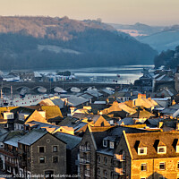 Buy canvas prints of Golden light over Looe looking up river  by Rosie Spooner