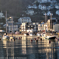 Buy canvas prints of Early morning reflections on The River Looe just after sunrise by Rosie Spooner