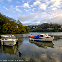Buy canvas prints of Boats moored by The Mill Pool  by Rosie Spooner