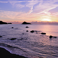 Buy canvas prints of Meadfoot Beach Sunrise in purple by Rosie Spooner