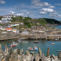 Buy canvas prints of Mevagissey outer harbour by Rosie Spooner