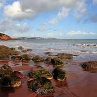 Buy canvas prints of  Red cliffs and sand at Broadsands Beach Torbay  by Rosie Spooner