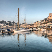 Buy canvas prints of  Early evening reflections at Torquay Harbour by Rosie Spooner