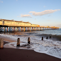 Buy canvas prints of  Teignmouth Pier at Golden Hour  by Rosie Spooner