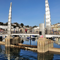 Buy canvas prints of  Blue Sky at Torquay Harbour and Bridge portrait  by Rosie Spooner