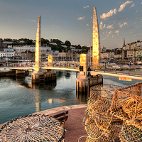 Buy canvas prints of Lobster pots at Torquay Harbour by Rosie Spooner