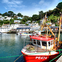 Buy canvas prints of Fishing boats at Polperro Harbour  by Rosie Spooner