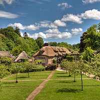 Buy canvas prints of Thatched cottages at Cockington Village Torquay by Rosie Spooner
