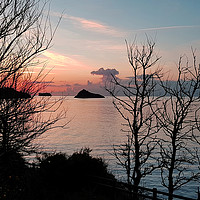 Buy canvas prints of Sunrise at Meadfoot Beach in Torquay through the t by Rosie Spooner