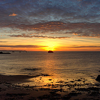 Buy canvas prints of Sunrise over Black Rock at Millendreath Beach Looe by Rosie Spooner