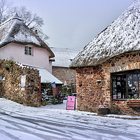 Buy canvas prints of Snowy day at Cockington Village in Torquay by Rosie Spooner
