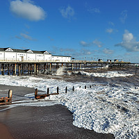 Buy canvas prints of Rough seas by the pier on Teignmouth Beach  by Rosie Spooner