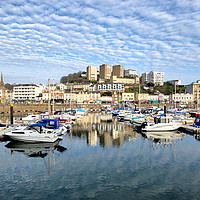 Buy canvas prints of Cloud Reflections early evening at Torquay Harbour by Rosie Spooner