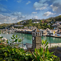Buy canvas prints of Looking down on The River Looe over the roof tops  by Rosie Spooner