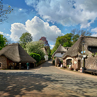 Buy canvas prints of Clouds gather at Cockington Village in Torquay by Rosie Spooner