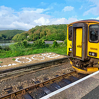 Buy canvas prints of GWR train arriving at Looe Station in Cornwall by Rosie Spooner