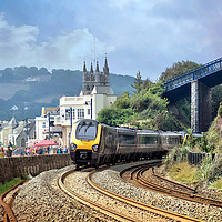 Buy canvas prints of Train approaching Teignmouth after leaving Dawlish by Rosie Spooner