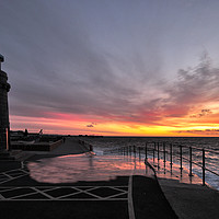 Buy canvas prints of Teignmouth Lighthouse at Sunrise and High Tide by Rosie Spooner