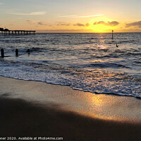 Buy canvas prints of Teignmouth Pier and Groyne at Sunrise by Rosie Spooner