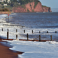 Buy canvas prints of Groynes and waves on Teignmouth Beach in South Devon by Rosie Spooner