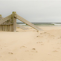 Buy canvas prints of Lossiemouth East beach wave breakers by Lloyd Fudge