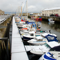 Buy canvas prints of the habour in Lossiemouth covered in snow by Lloyd Fudge
