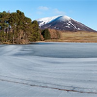 Buy canvas prints of Frozen Loch Moraig by David Brown