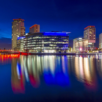 Buy canvas prints of Reflecting at Media City by Steven Purcell