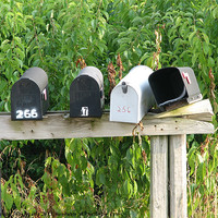 Buy canvas prints of Mailboxes on the shelf by Pics by Jody Adams