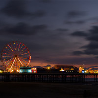 Buy canvas prints of Blackpool South Pier at sunset by Paul Watson