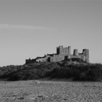 Buy canvas prints of Bamburgh Castle by Susan Mundell