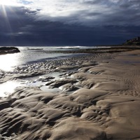 Buy canvas prints of Bamburgh Beach by Terry Carter