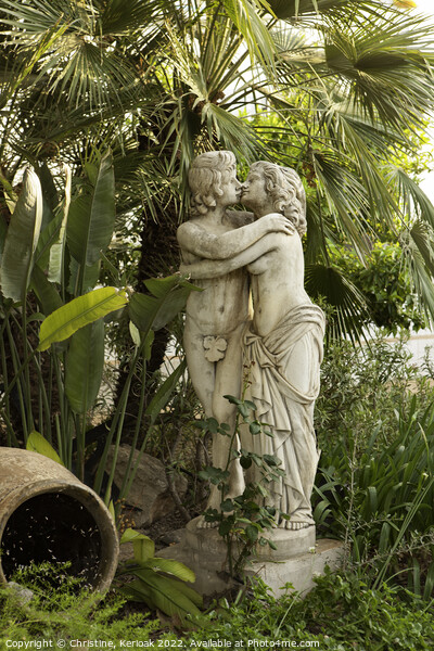 Statue of Lovers Kissing in Garden Picture Board by Christine Kerioak