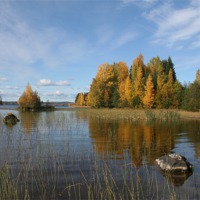 Buy canvas prints of Autumn colors on the lake by Hemmo Vattulainen