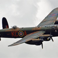 Buy canvas prints of Lancaster Bomber Dambusters flyover by Louise  Hawkins