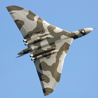 Buy canvas prints of Avro Vulcan over the Midlands by Andrew Steer