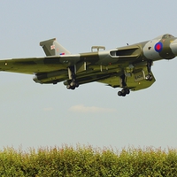 Buy canvas prints of Vulcan over the hedge by Andrew Steer