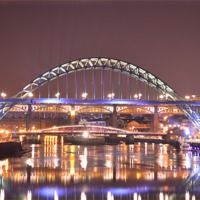 Buy canvas prints of Tyne Bridges at night, by Carly Mahone