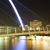 Buy canvas prints of Millennium Bridge at Night by Carly Mahone