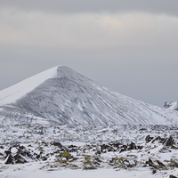 Buy canvas prints of snow covered icelandic mountains by Carly Mahone
