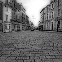 Buy canvas prints of down the high street by chrissy woodhouse