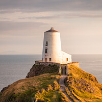 Buy canvas prints of A Majestic Sunset at Llanddwyn Lighthouse by Andy McGarry