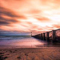 Buy canvas prints of Tranquil Sunset at Bournemouth Beach by Daniel Rose