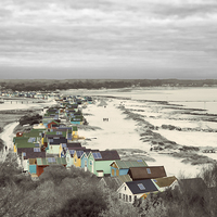 Buy canvas prints of Vivid Mudeford Quay Beach Huts by Daniel Rose