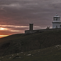 Buy canvas prints of Majestic Sunset at Anvil Point Lighthouse by Daniel Rose