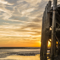 Buy canvas prints of End of the Pier Sunset by Malcolm McHugh