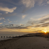 Buy canvas prints of Majestic Sunset over Worthing Beach by Malcolm McHugh